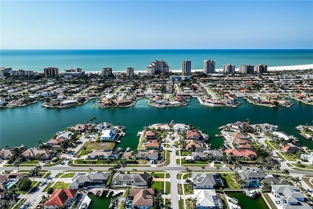 bird's eye view with a water view