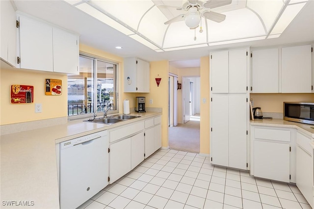 kitchen featuring sink, white cabinetry, ceiling fan, and dishwasher