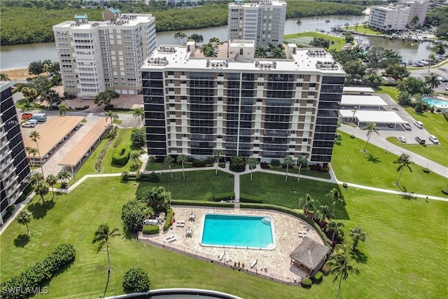 birds eye view of property with a water view