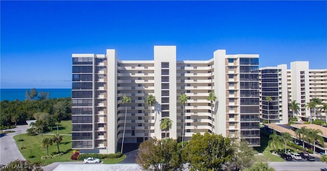 view of building exterior featuring a water view