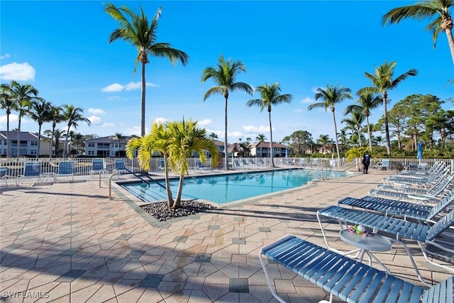 view of swimming pool featuring a patio area