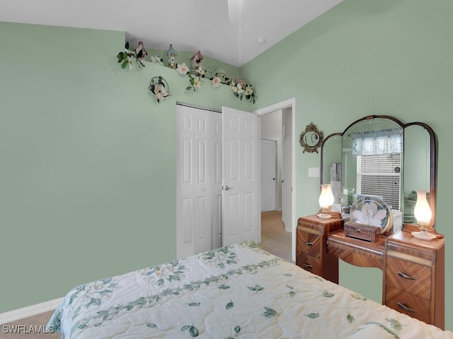 bedroom with carpet floors and a closet