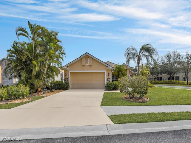 ranch-style home featuring a garage and a front yard