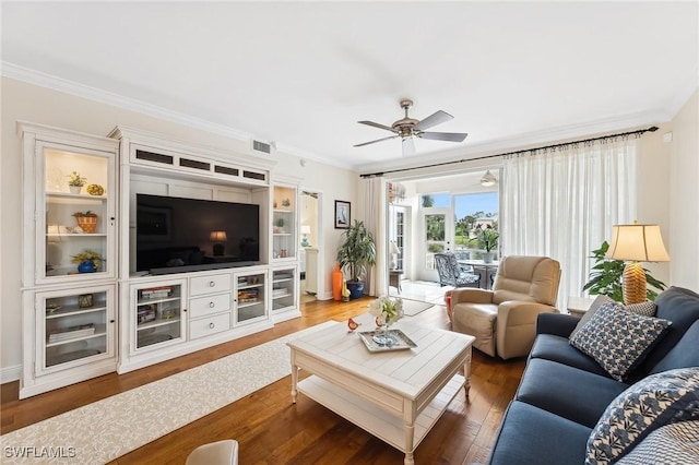 living room featuring ceiling fan, crown molding, and dark hardwood / wood-style floors