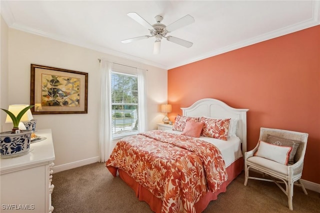 carpeted bedroom with ceiling fan and ornamental molding