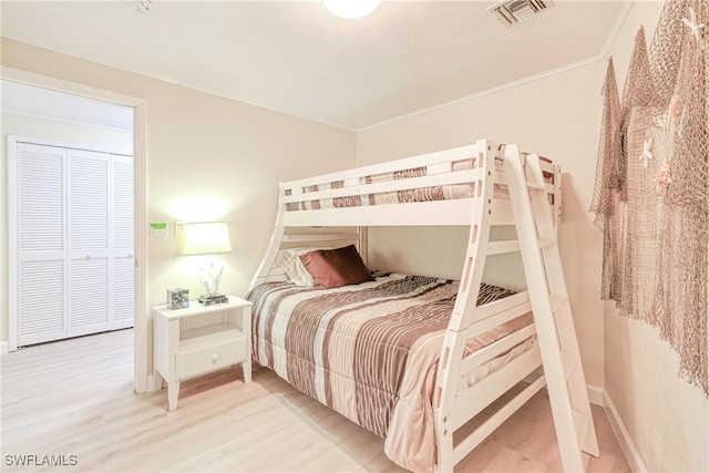 bedroom with light wood-type flooring