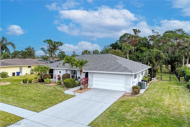 single story home featuring a front yard, a garage, and cooling unit