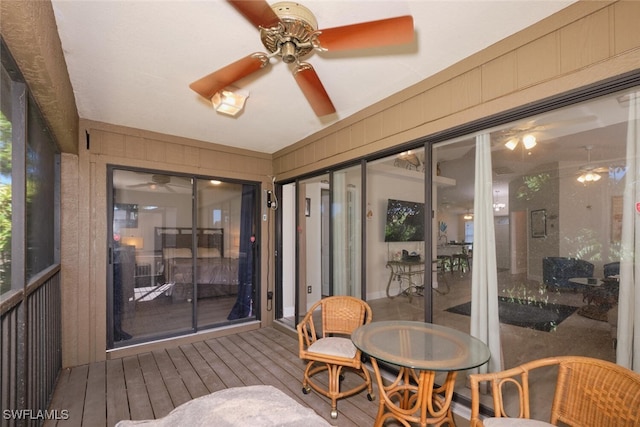 sunroom / solarium with ceiling fan