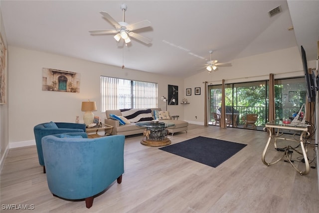 living room with vaulted ceiling, ceiling fan, and light hardwood / wood-style flooring