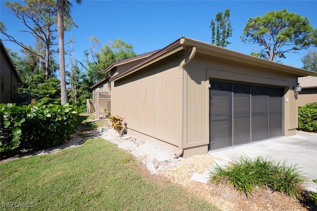 garage with a lawn