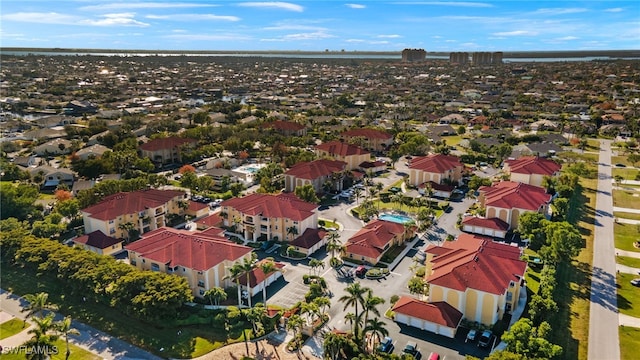 birds eye view of property with a residential view