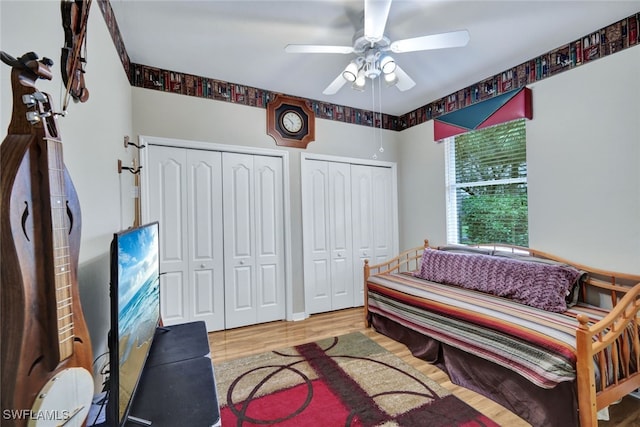 living area with light wood-type flooring and ceiling fan