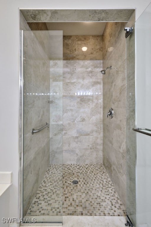 bathroom featuring an enclosed shower