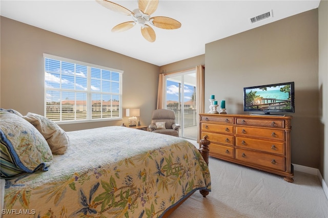 bedroom featuring visible vents, a ceiling fan, light carpet, access to outside, and baseboards