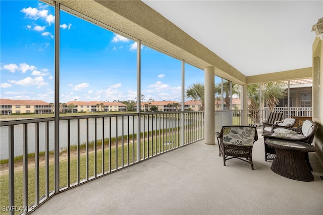 sunroom with a residential view