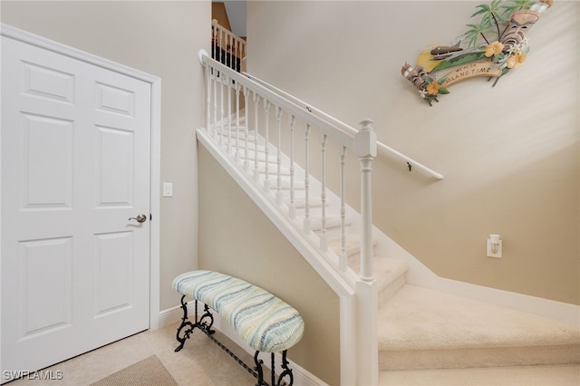 stairway with baseboards