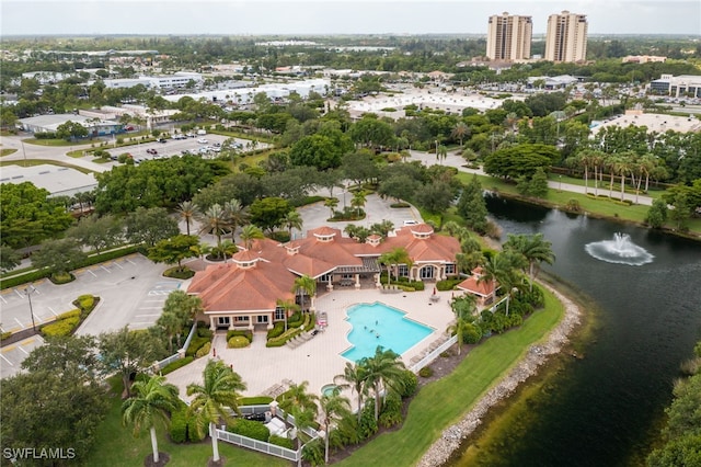 birds eye view of property featuring a water view