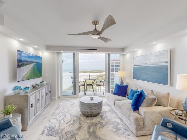 living room featuring ceiling fan