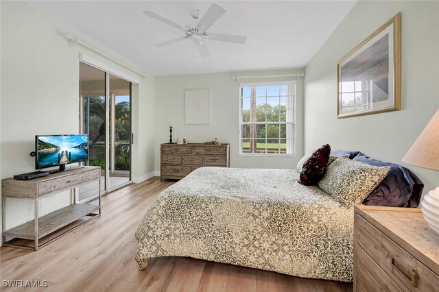 bedroom with light hardwood / wood-style flooring and ceiling fan