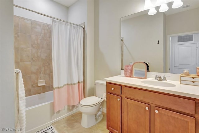 full bathroom featuring toilet, tile patterned flooring, vanity, and shower / tub combo with curtain