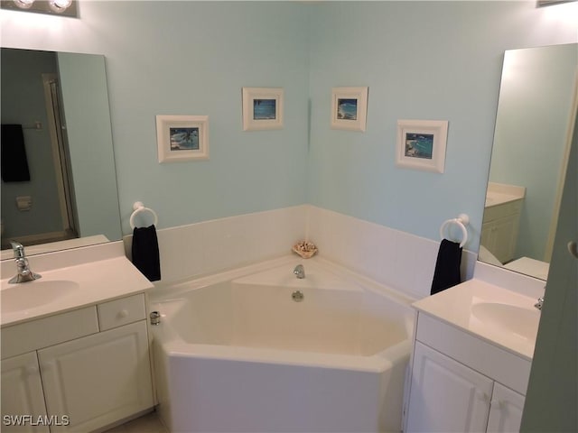 bathroom featuring a bathtub and vanity