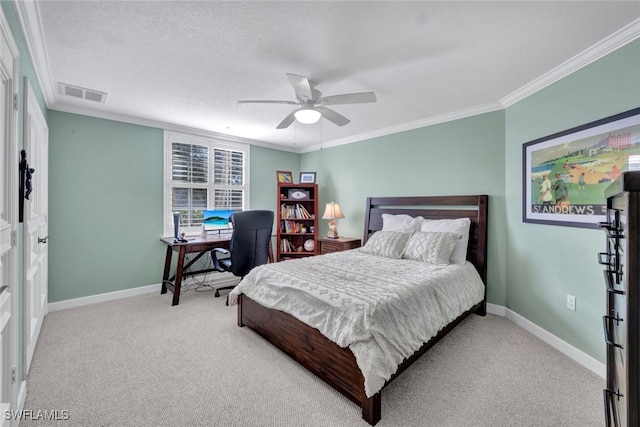 bedroom featuring ornamental molding, carpet, visible vents, and baseboards