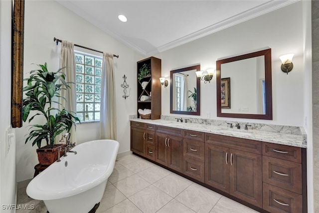 bathroom with lofted ceiling, a soaking tub, double vanity, and a sink