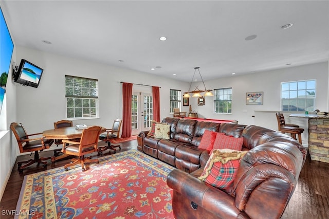 living room with french doors, wood finished floors, and recessed lighting