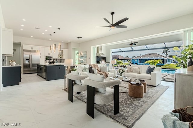 living room with ceiling fan