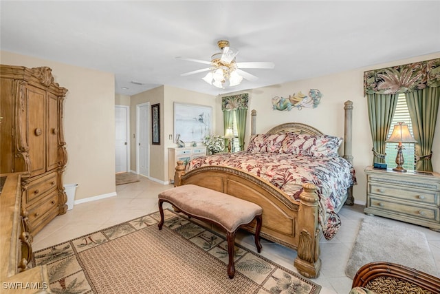 tiled bedroom with ceiling fan