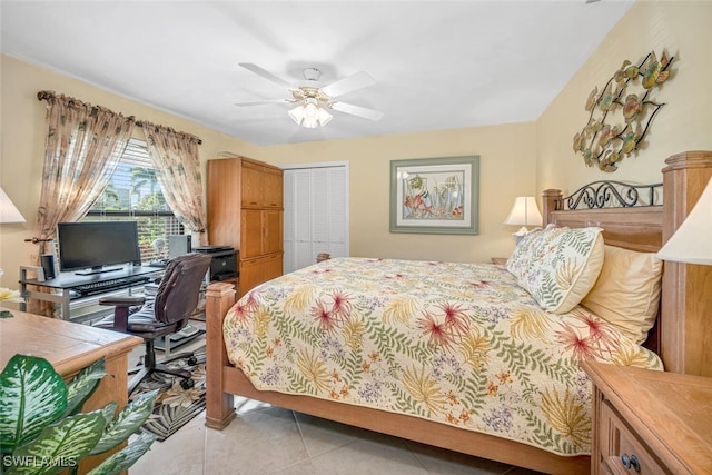 tiled bedroom featuring a closet and ceiling fan