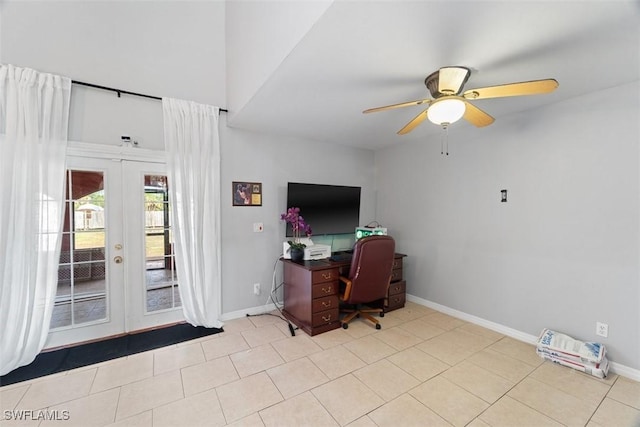 tiled office with ceiling fan and french doors