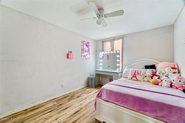 bedroom featuring ceiling fan and hardwood / wood-style floors