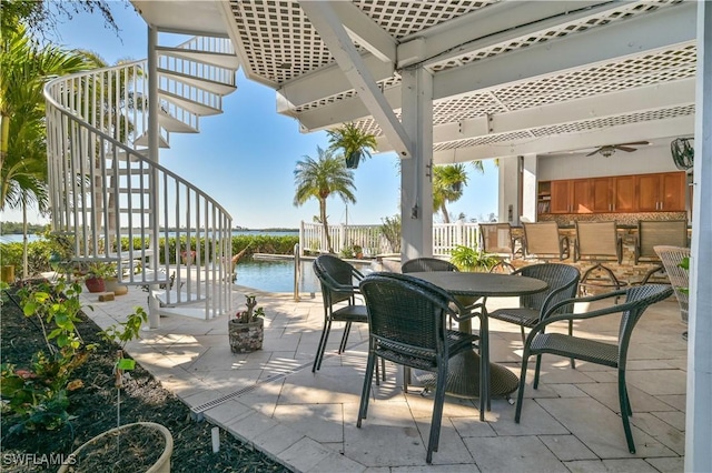 view of patio / terrace with a water view