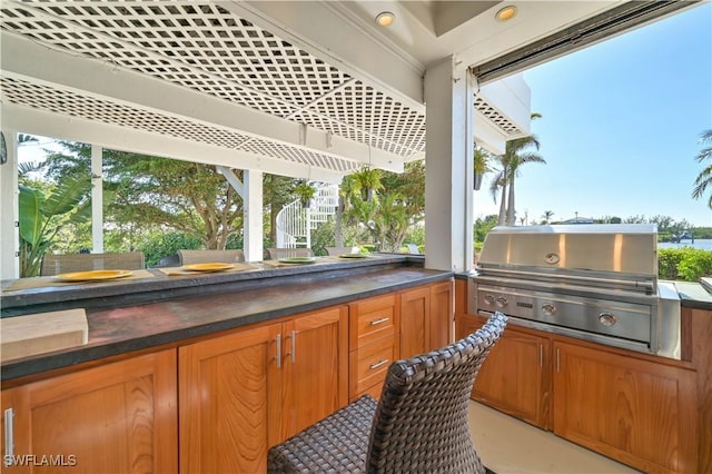 view of patio / terrace with exterior kitchen and grilling area