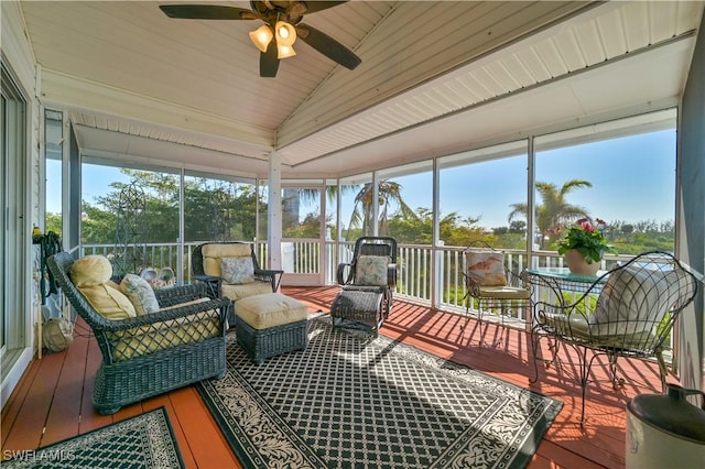 sunroom / solarium featuring ceiling fan and lofted ceiling