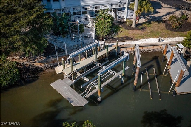 dock area with a water view