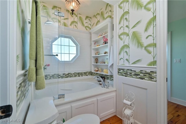 bathroom featuring hardwood / wood-style floors and a tub