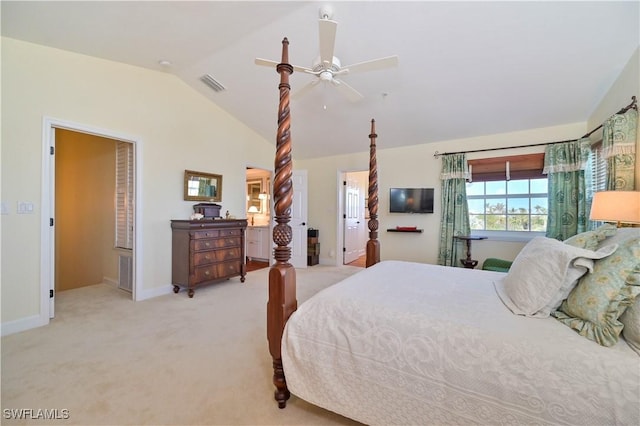 carpeted bedroom featuring ceiling fan and vaulted ceiling