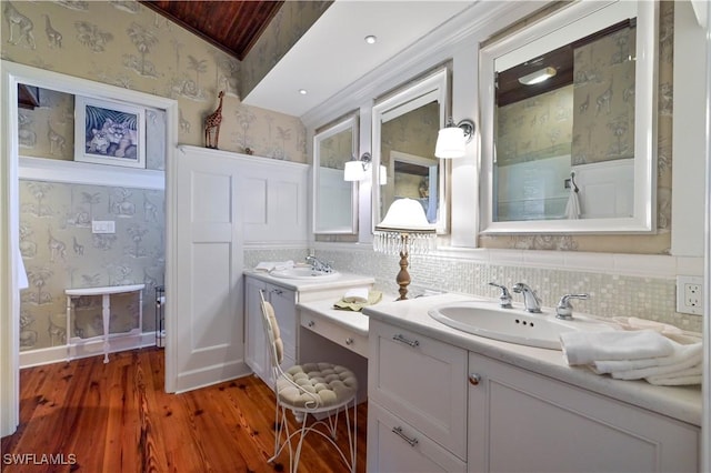 bathroom with vanity, wood-type flooring, crown molding, and wooden ceiling