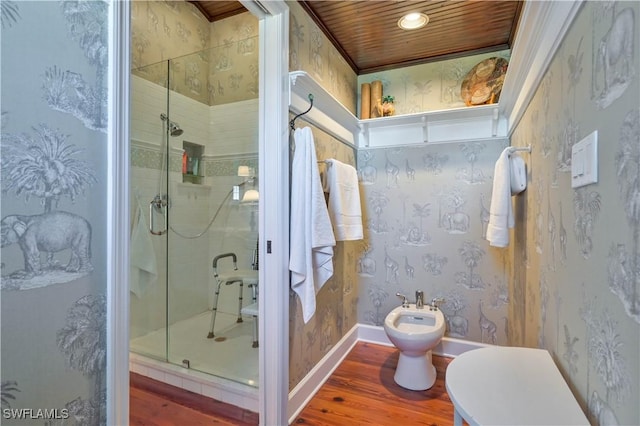 bathroom with hardwood / wood-style flooring, a shower with shower door, wood ceiling, and a bidet