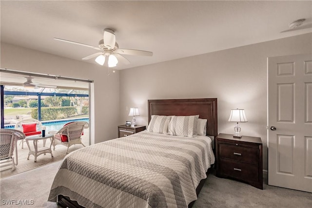 bedroom featuring light colored carpet and ceiling fan