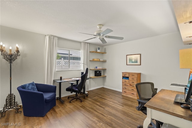 office with hardwood / wood-style flooring and ceiling fan