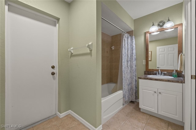 bathroom featuring shower / bath combination with curtain, tile patterned floors, and vanity