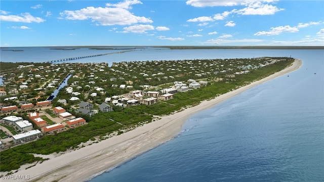 drone / aerial view featuring a view of the beach and a water view