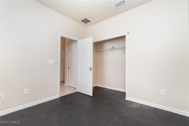 unfurnished bedroom featuring a closet