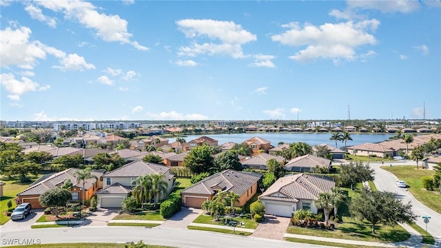 drone / aerial view featuring a water view