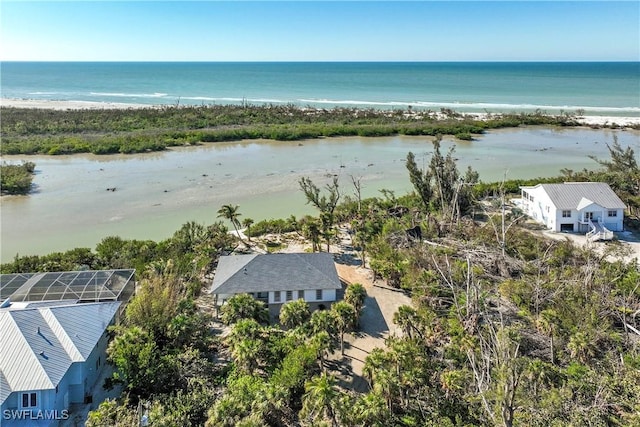 aerial view with a beach view and a water view