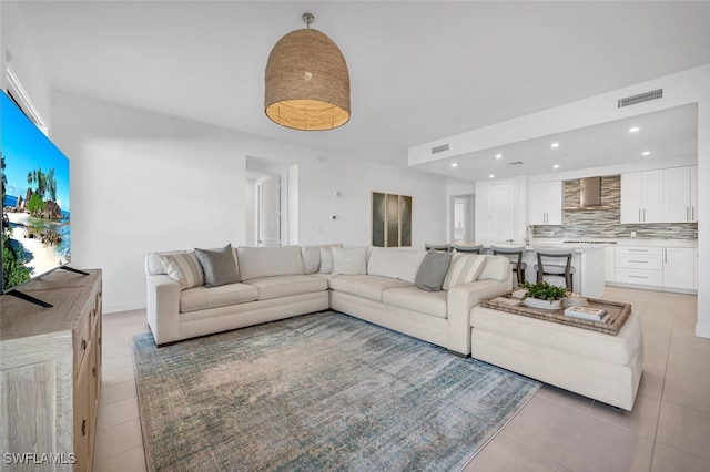 living room featuring light tile patterned flooring