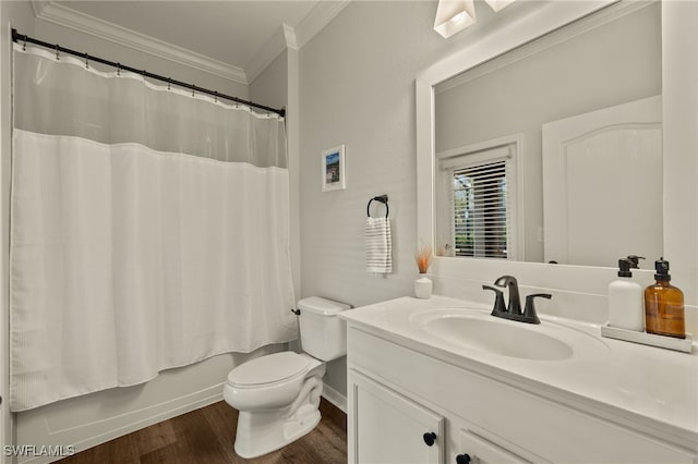 full bathroom featuring toilet, shower / tub combo with curtain, hardwood / wood-style floors, crown molding, and vanity